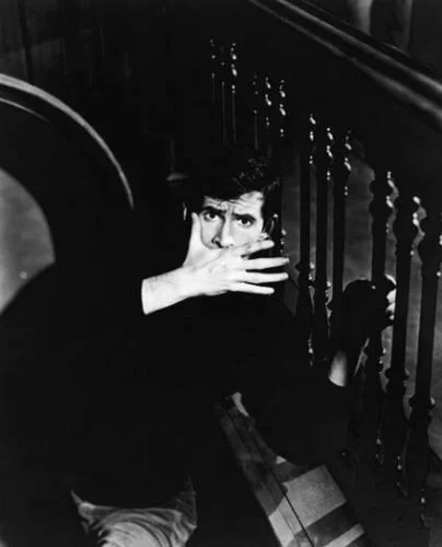 Anthony Perkins as Norman Bates in a promotional still from Alfred Hitchcock's Psycho (1960)